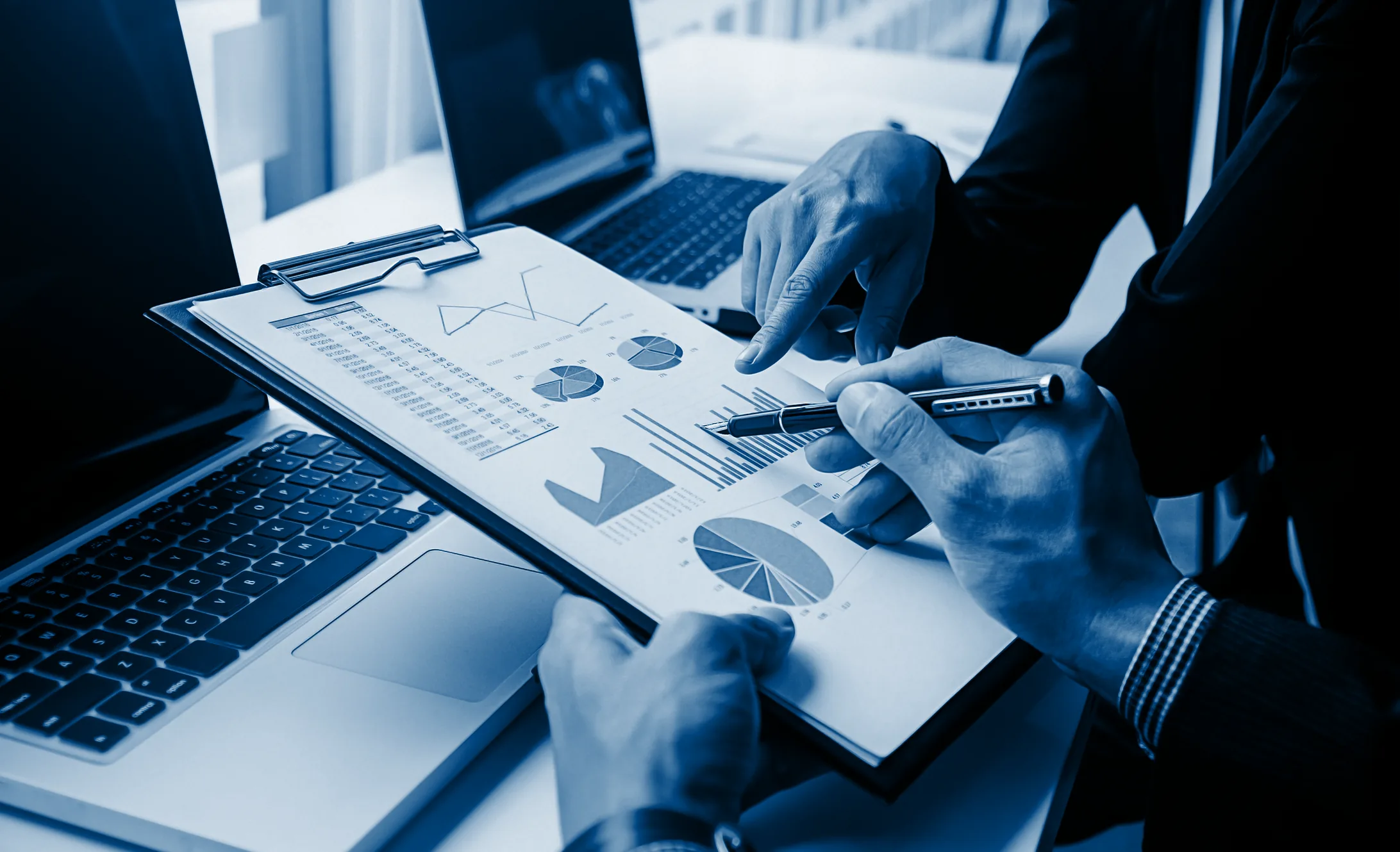 A team reviewing IT asset reports together